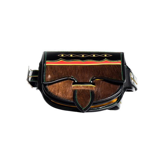 Brown leather bag with decorative elements on a white background