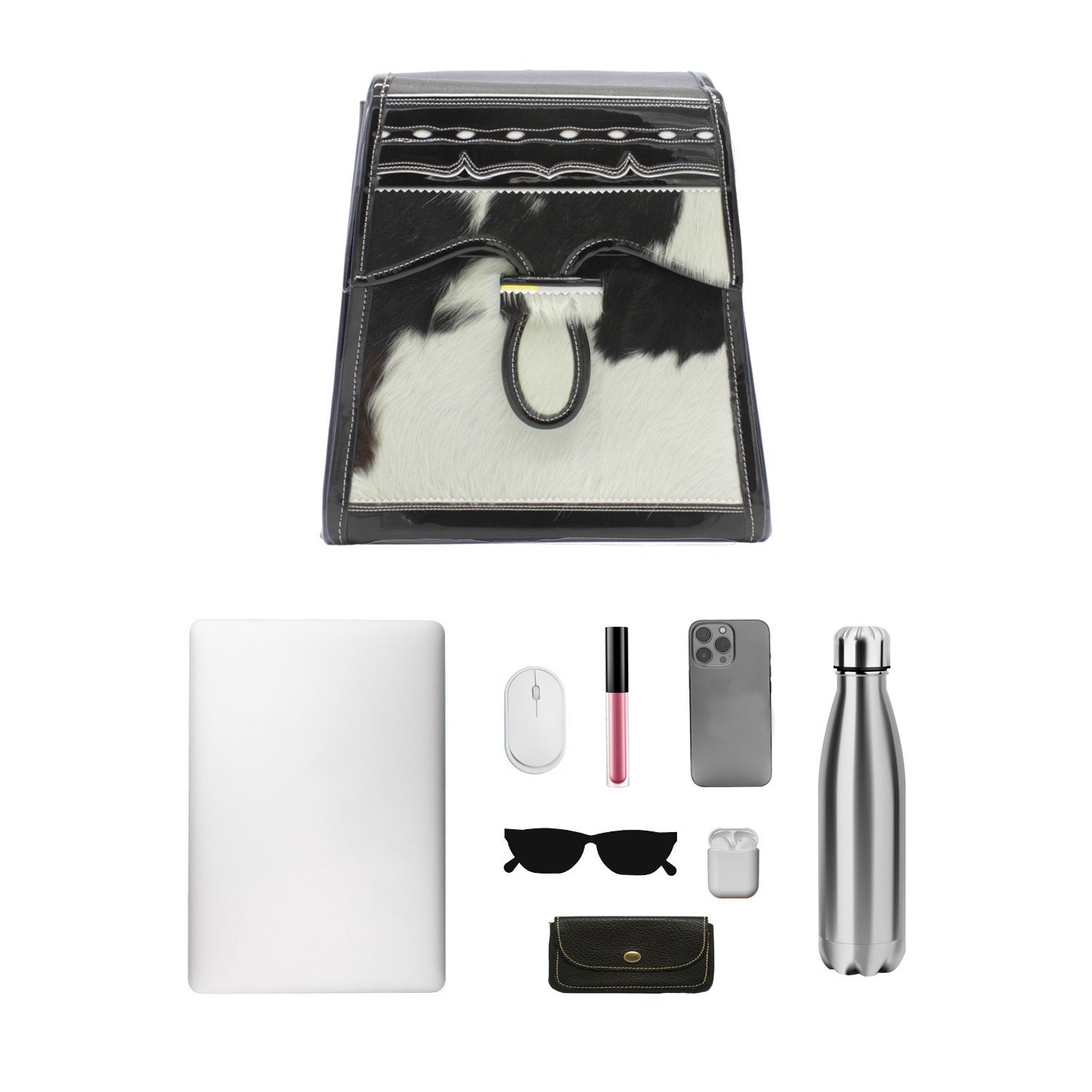 Collection of fashion and lifestyle items that fit in a leather black and white cowhide handbag, phone case, water bottle, and accessories on a white background.