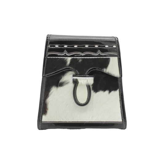 Handbag with black and white cowhide pattern on a white background